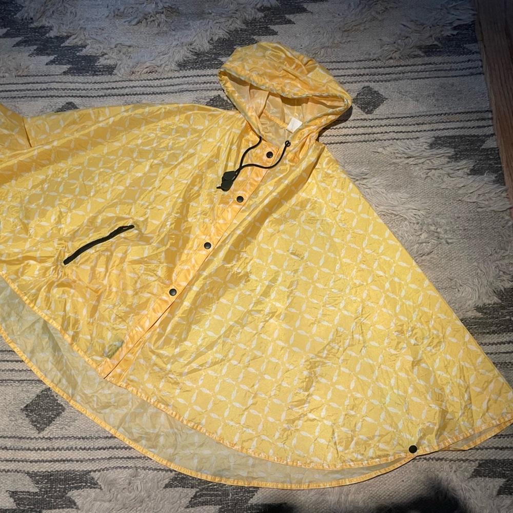 Caper Poncho, collapses into pocket